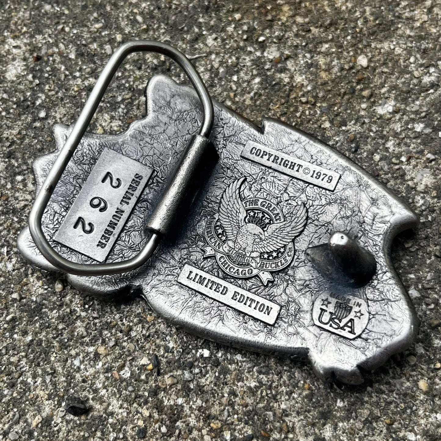 1979 Gear head belt buckle.