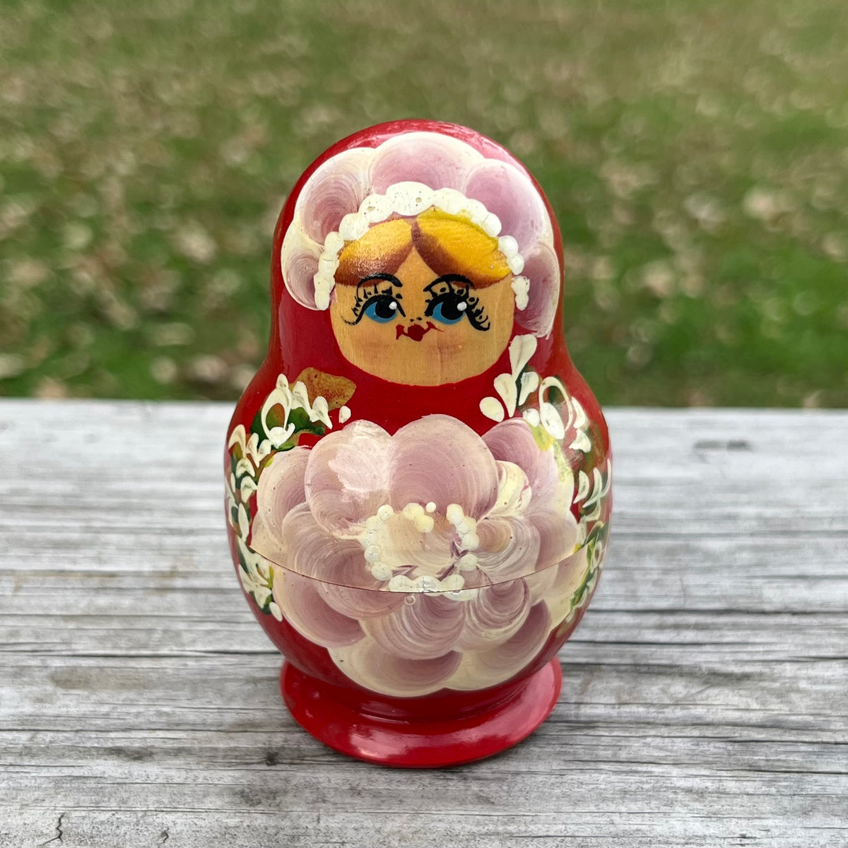 Vintage wooden nesting doll set of five.
