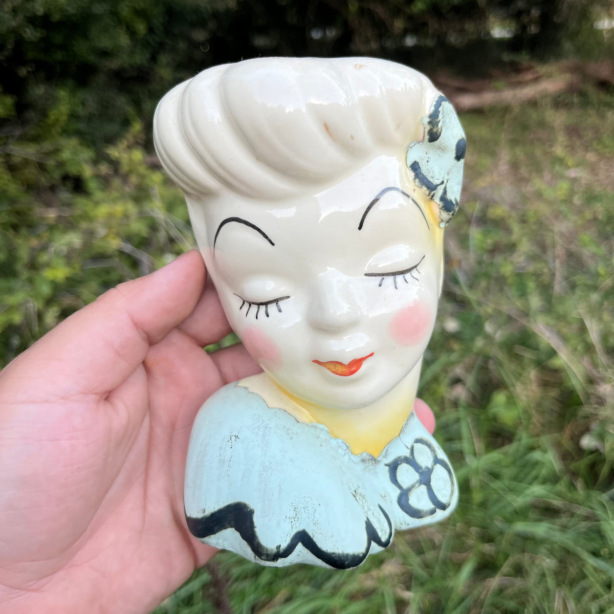 Vintage Lady head wall pocket.
