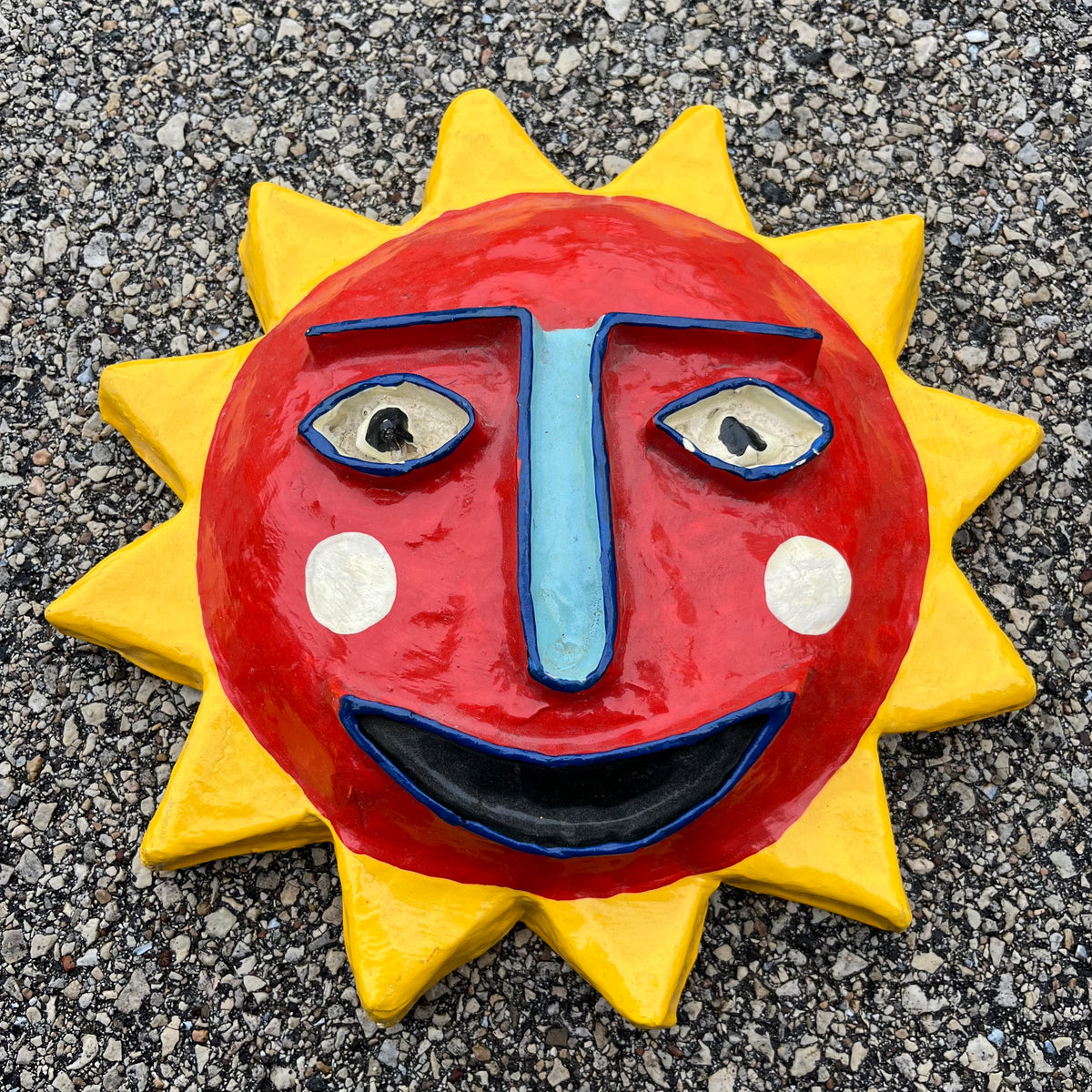 Vintage paper mache sun mask.