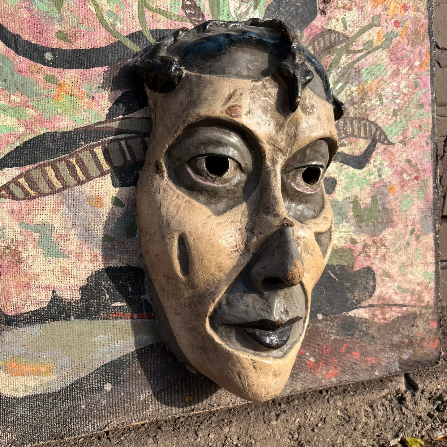 1960s Mixed media Día de los Muertos mask on canvas.