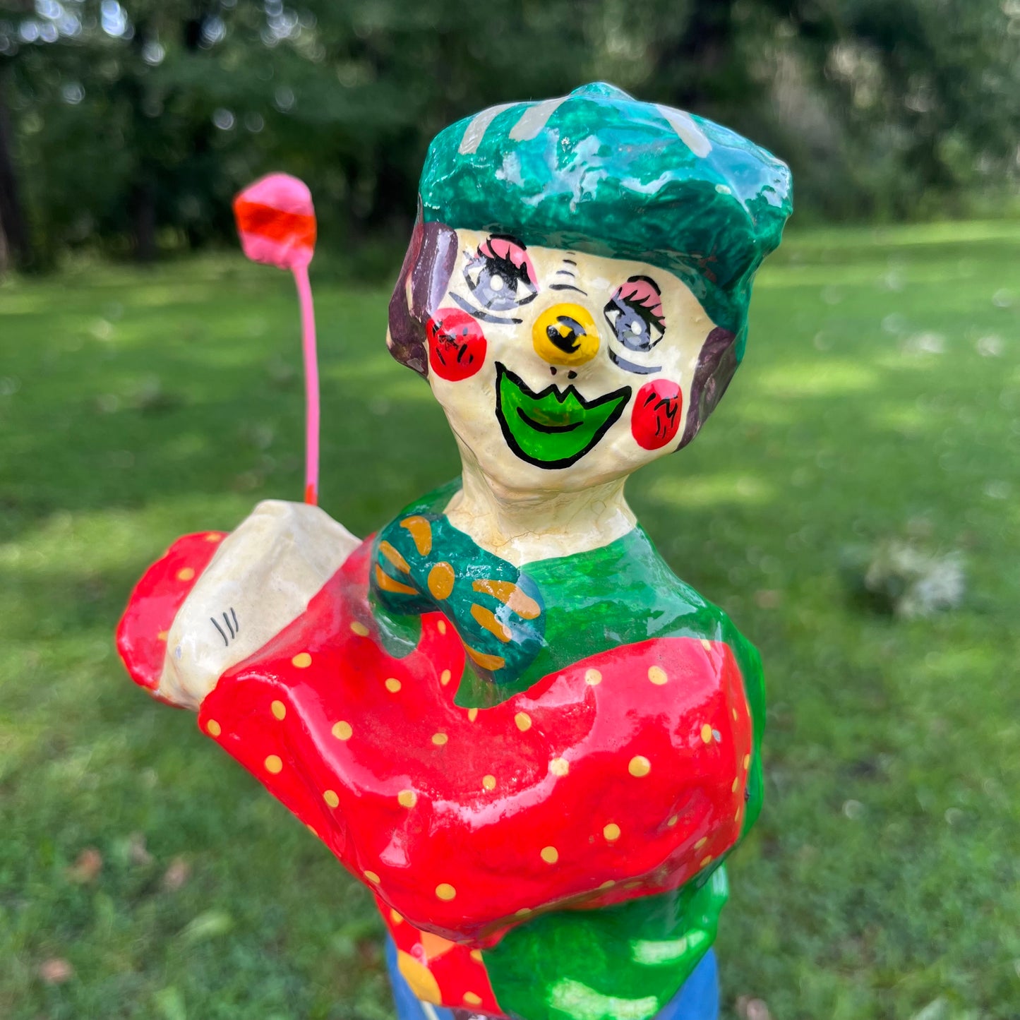Vintage paper mache golfer clown.