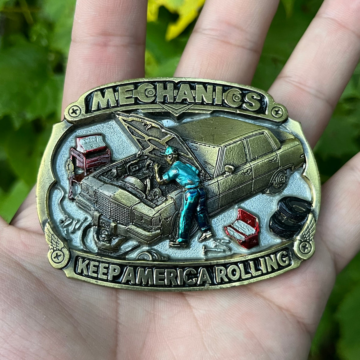 1987 Mechanics of America belt buckle.