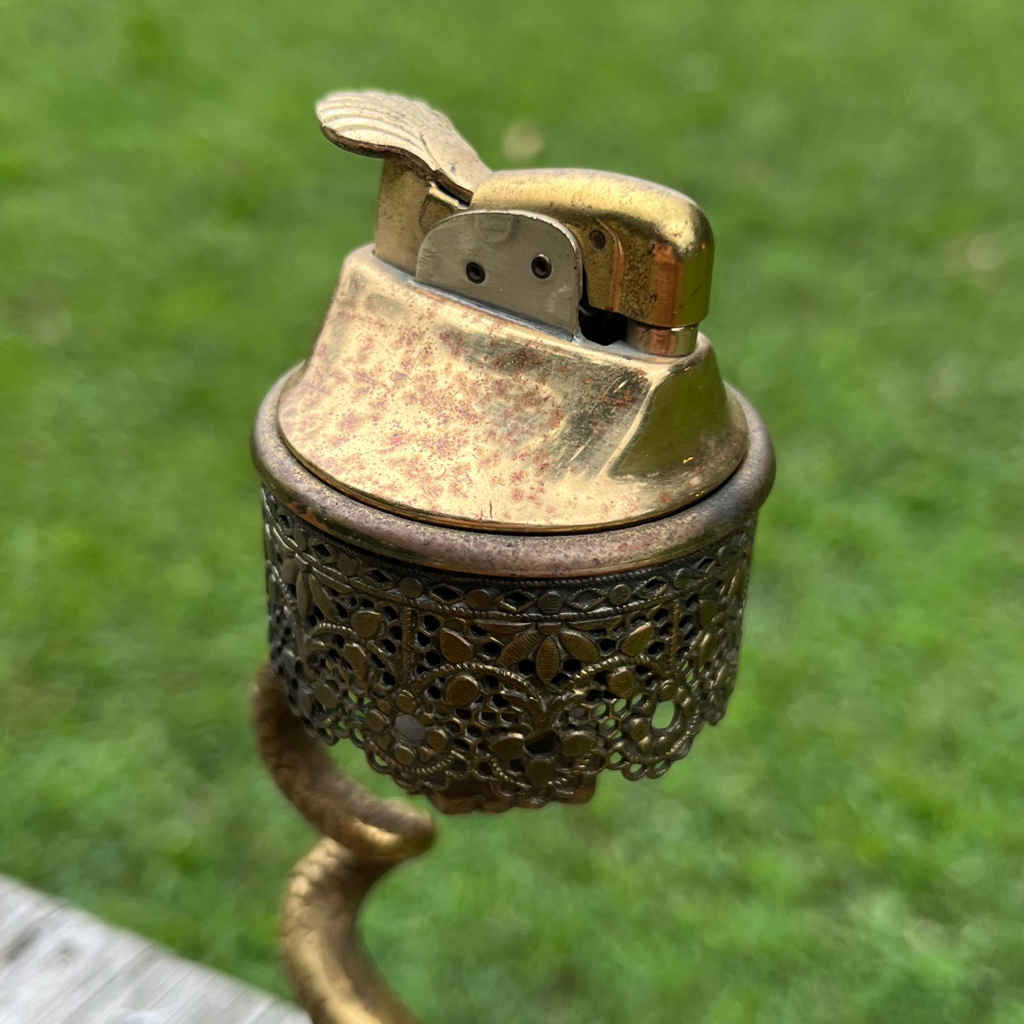 Rare 1950s brass serpent tabletop lighter.