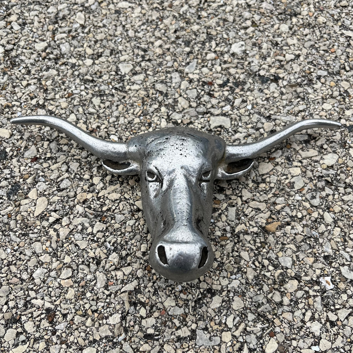 Vintage pewter longhorn hood ornament.