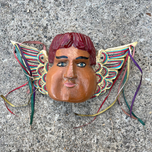 Vintage decorative cherub wood carving.