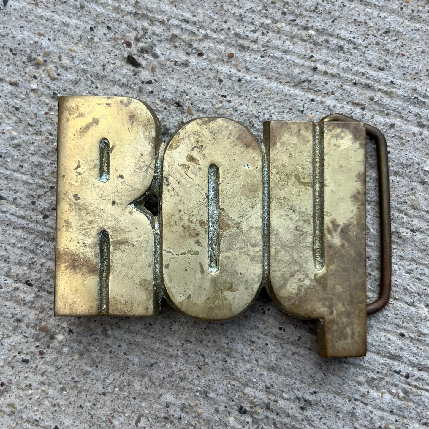 1978 Brass “Roy” belt buckle.