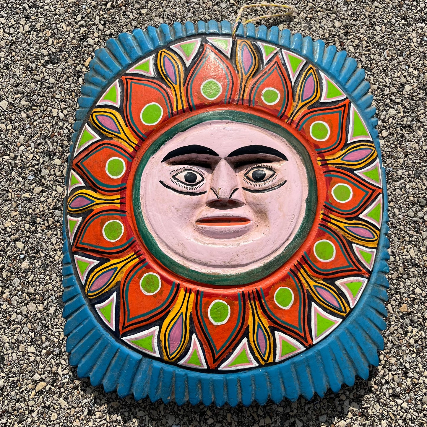 Vintage hand crafted sun mask.