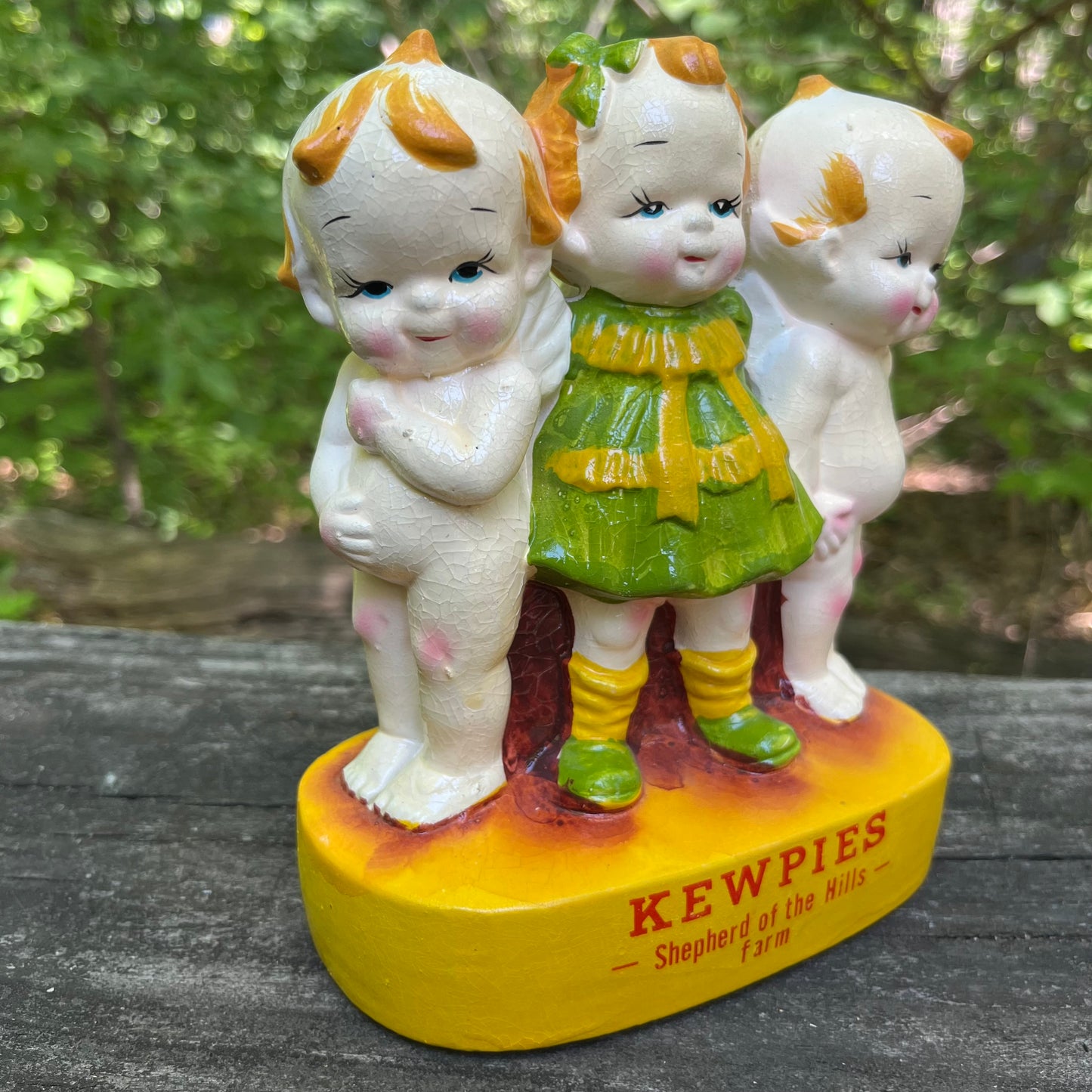 Vintage chalkware Kewpies.