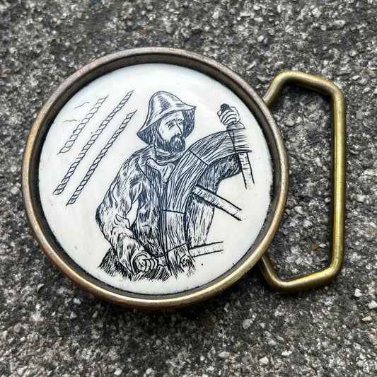 1980s B.T.S. Captain scrimshaw belt buckle.