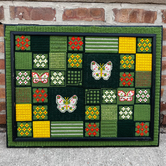 Framed 1970s Buttetfly needlepoint.