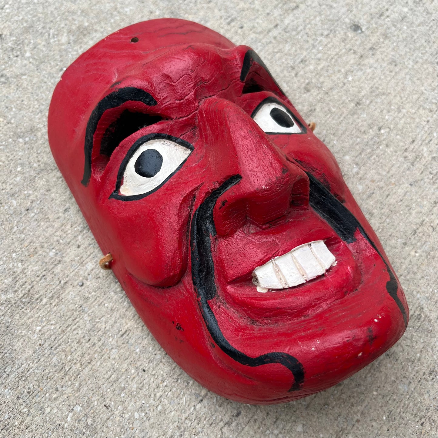 Vintage red demon mask.