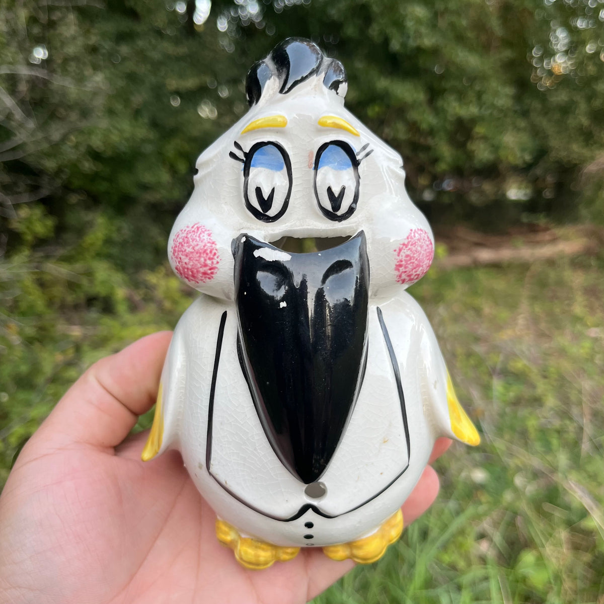 Vintage Tucan string holder.