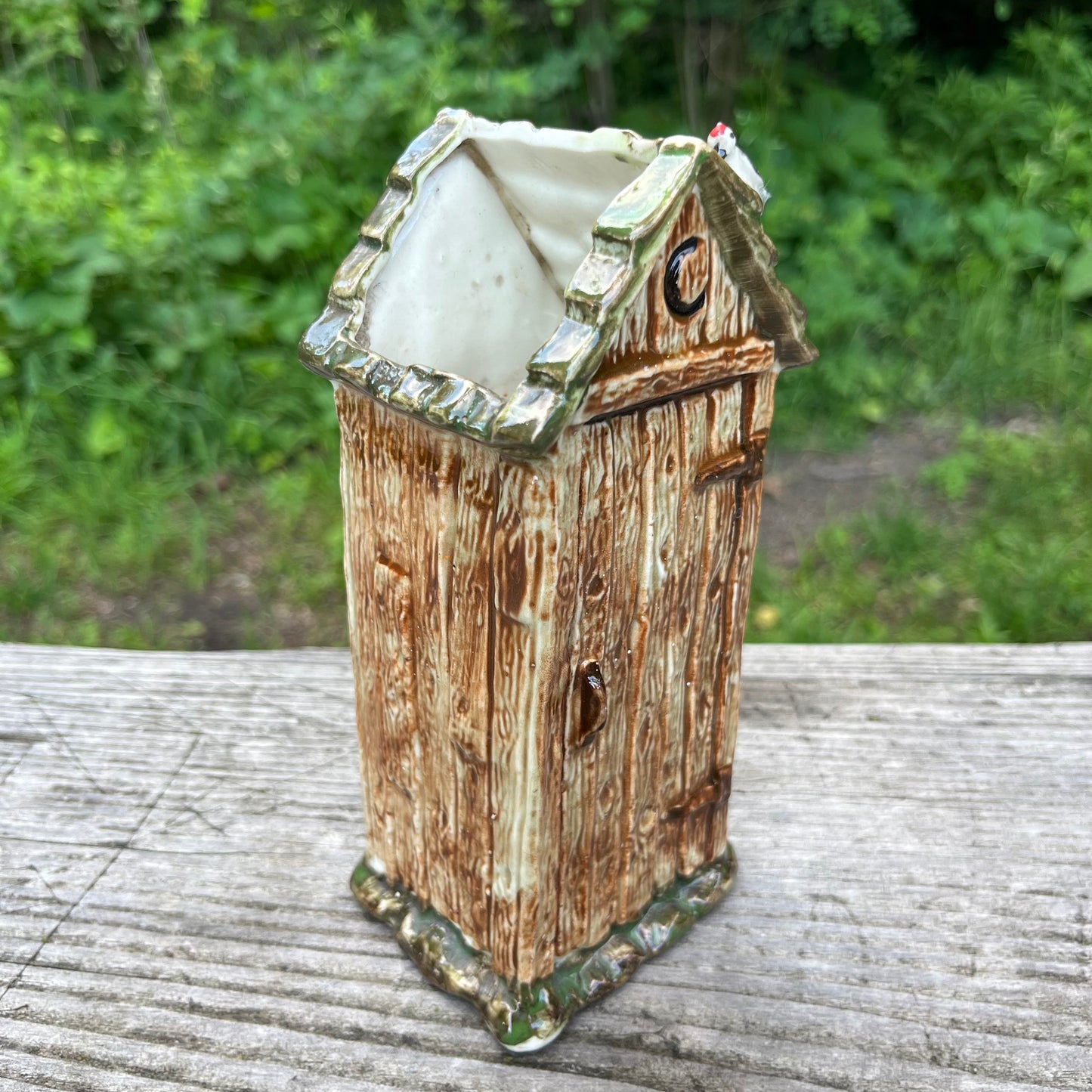 1936 Mountian man outhouse planter.