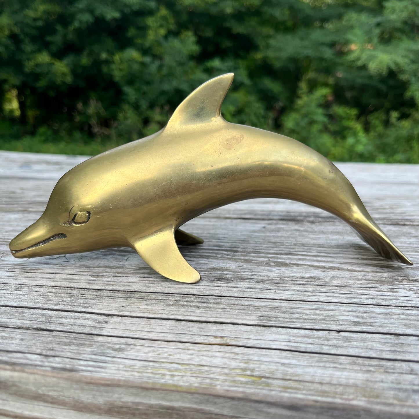 Vintage brass dolphin.