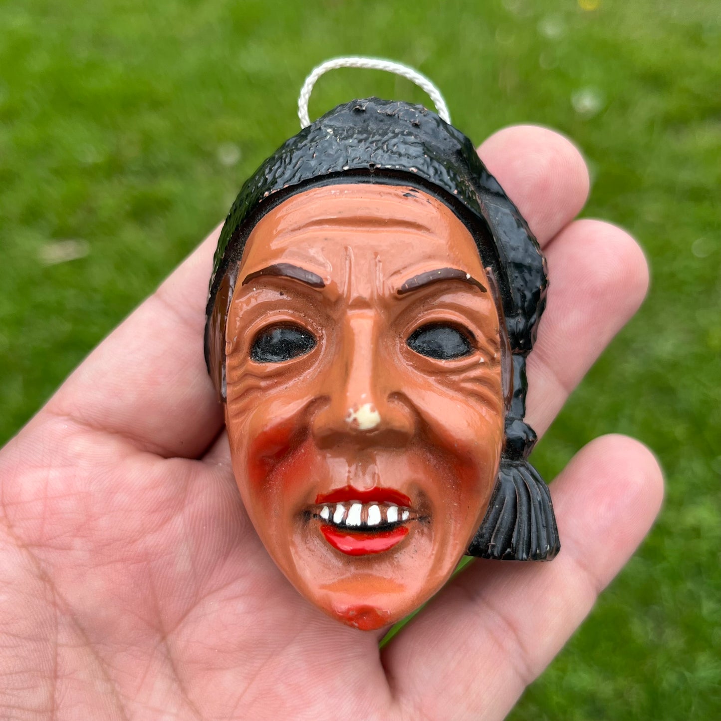 Vintage resin souvenir mask.