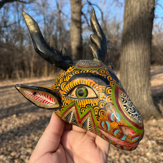 Vintage decorative deer wood carving.