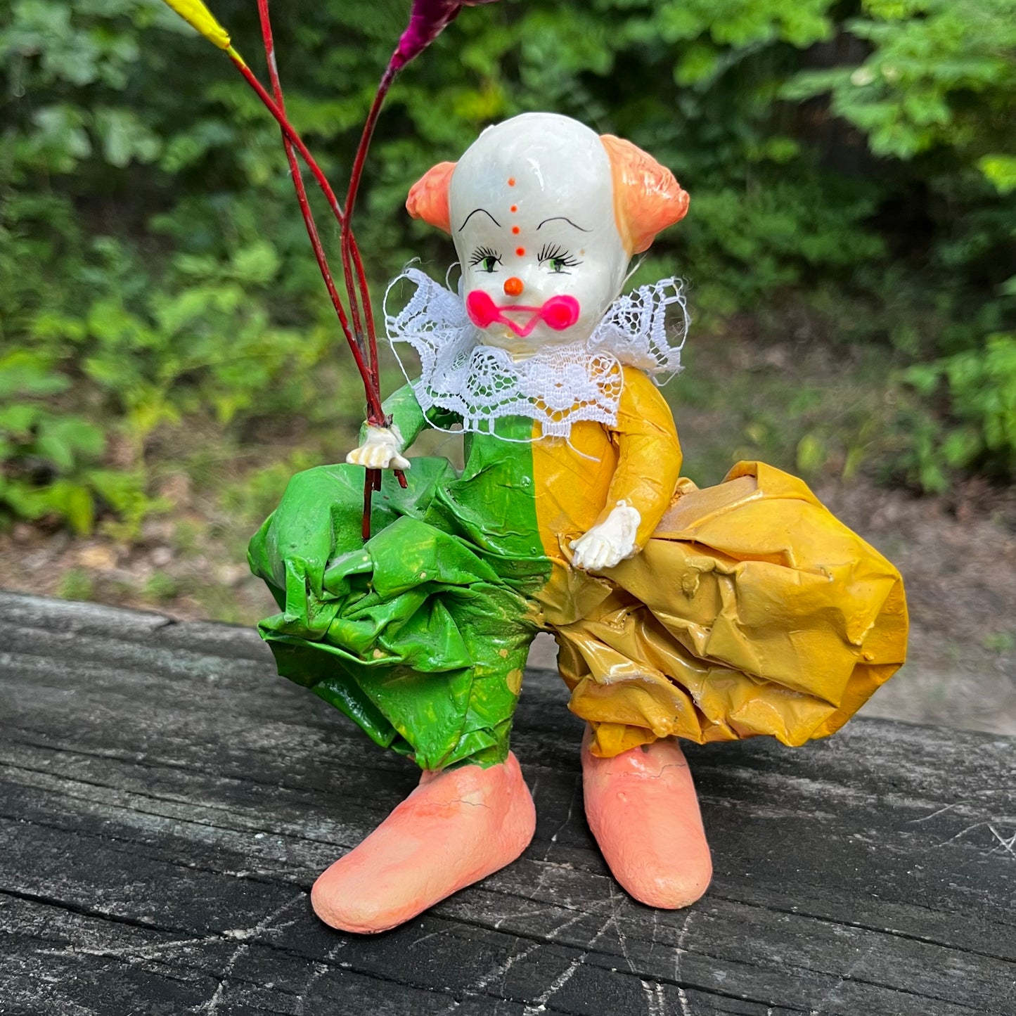 Vintage paper mache clown.