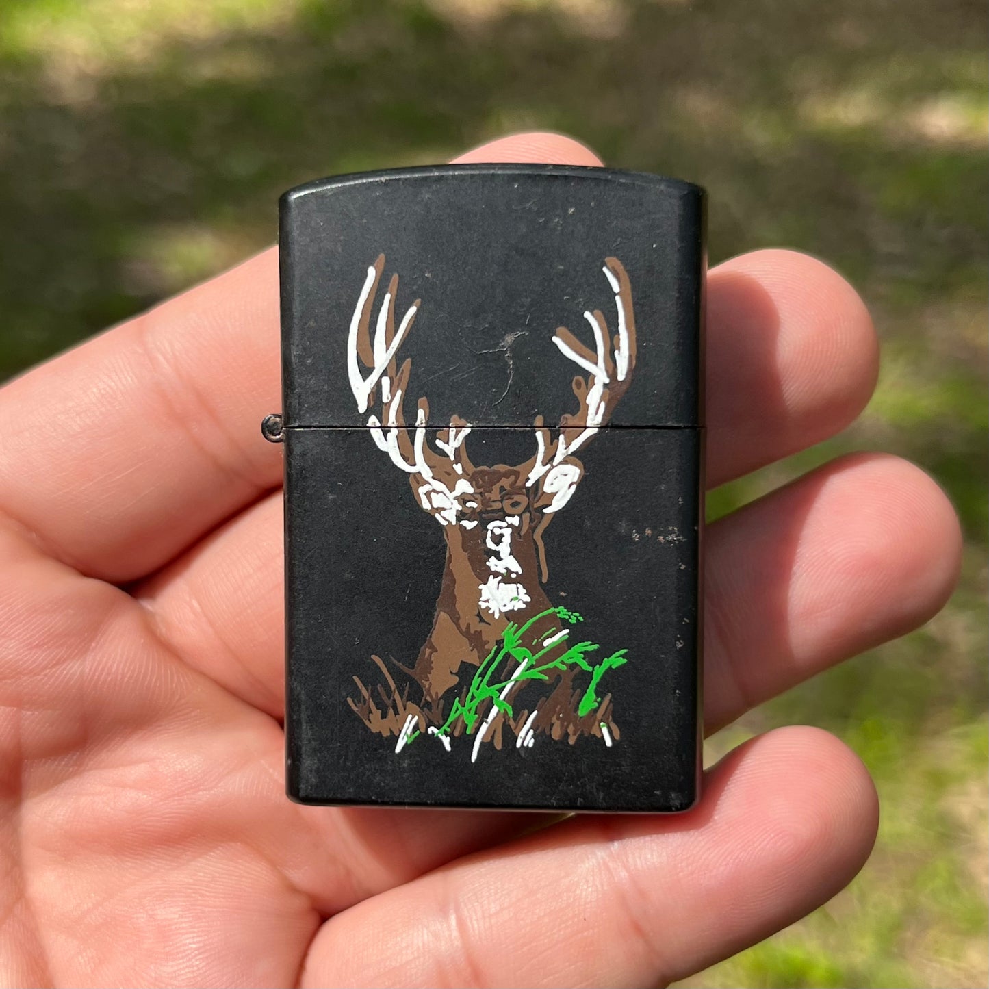90s Buck flip lighter.