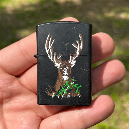 90s Buck flip lighter.