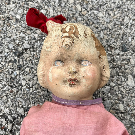 Early 1900s composition doll.
