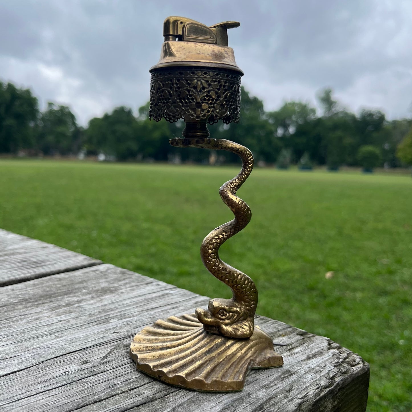 Rare 1950s brass serpent tabletop lighter.