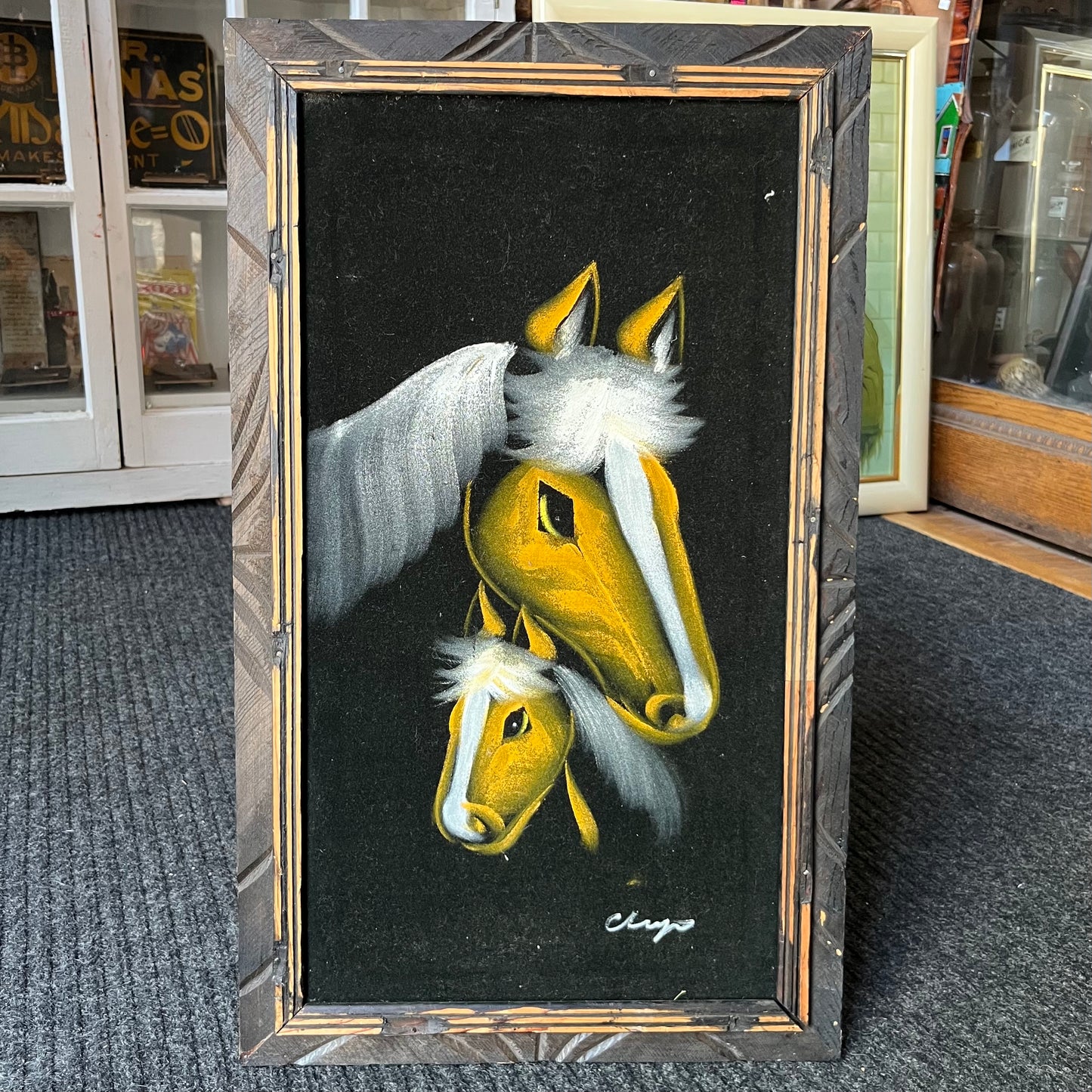1970s Horses painted on black velvet.