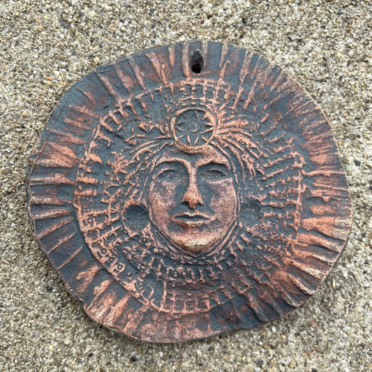 Vintage “Respect earth and life” clay medallion.