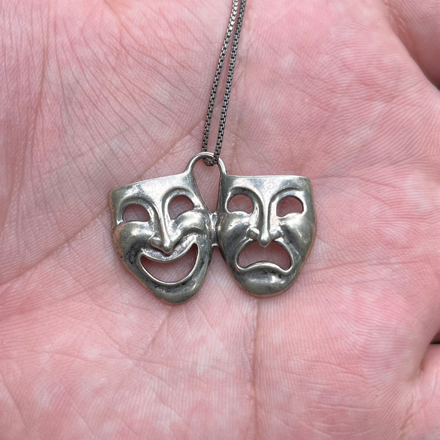 Vintage Sterling silver drama mask necklace.
