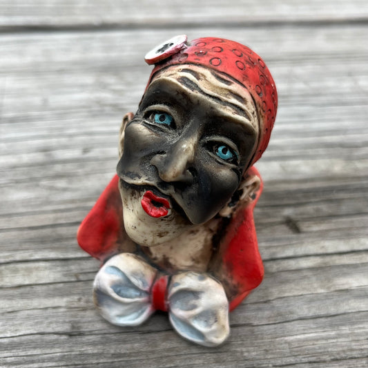 Vintage resin jester.