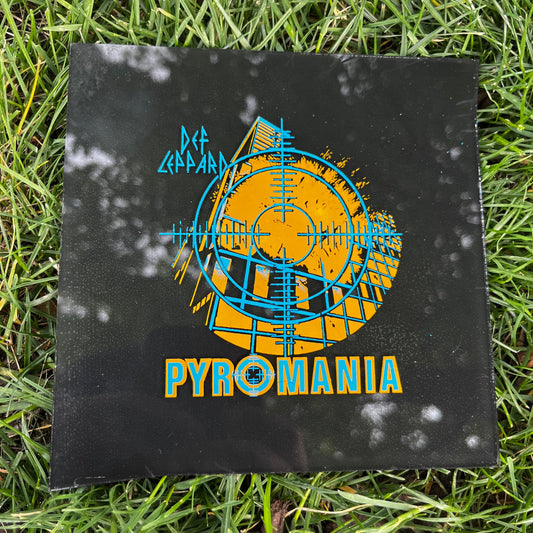 1980s Def Leppard "Pyromania" carnival glass.