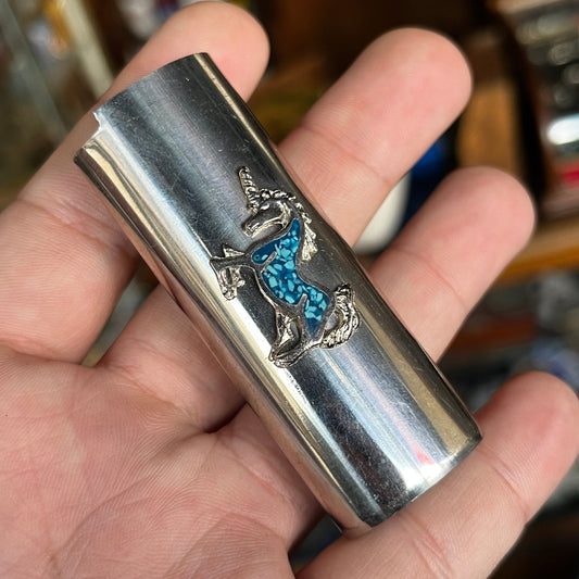 1980s Unicorn lighter sleeve.