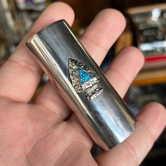 1980s Arrowhead lighter sleeve.