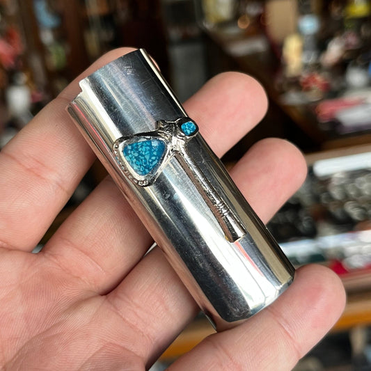 1980s Tomahawk lighter sleeve.