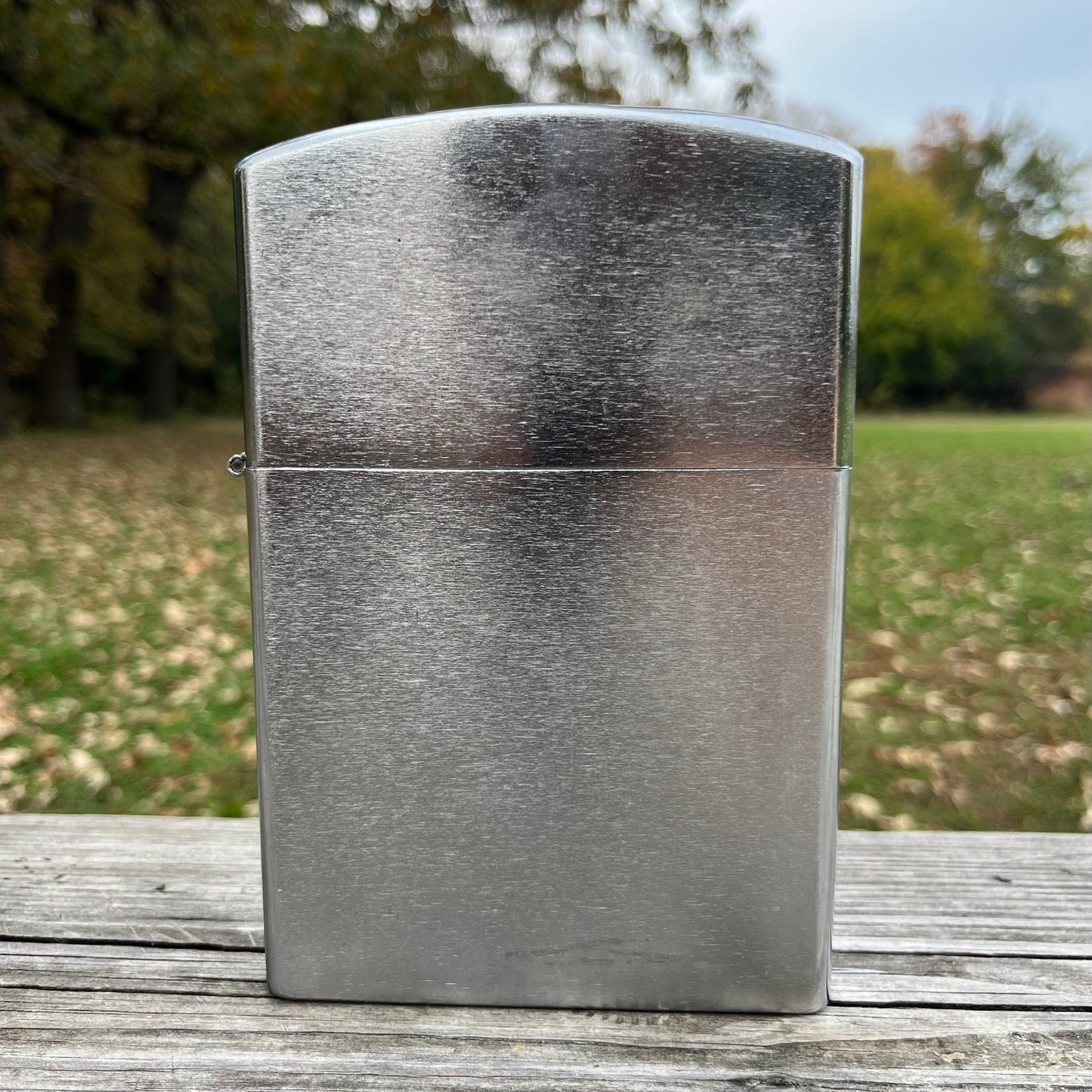 Vintage oversized flip lighter.
