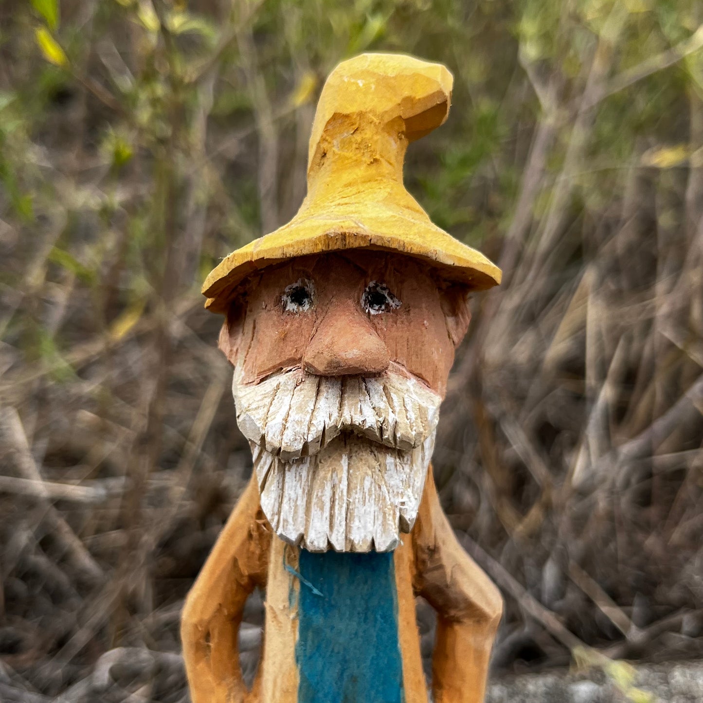 Hand carved moonshiner.