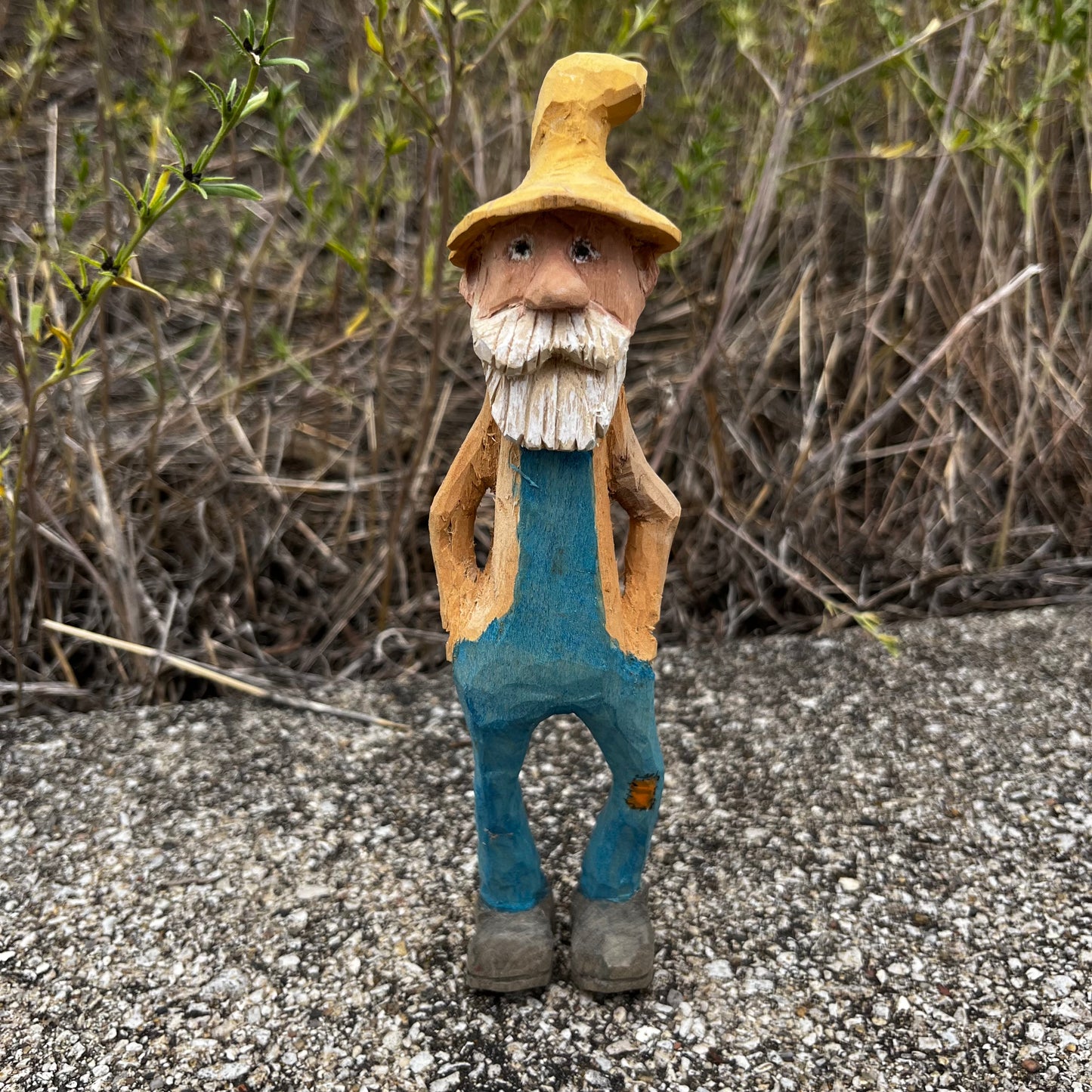 Hand carved moonshiner.