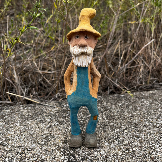Hand carved moonshiner.