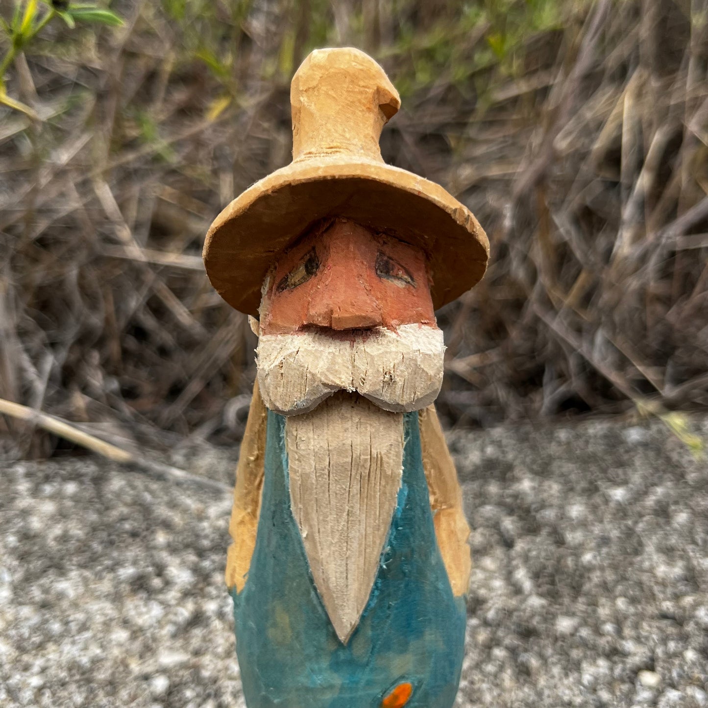 Hand carved moonshiner.