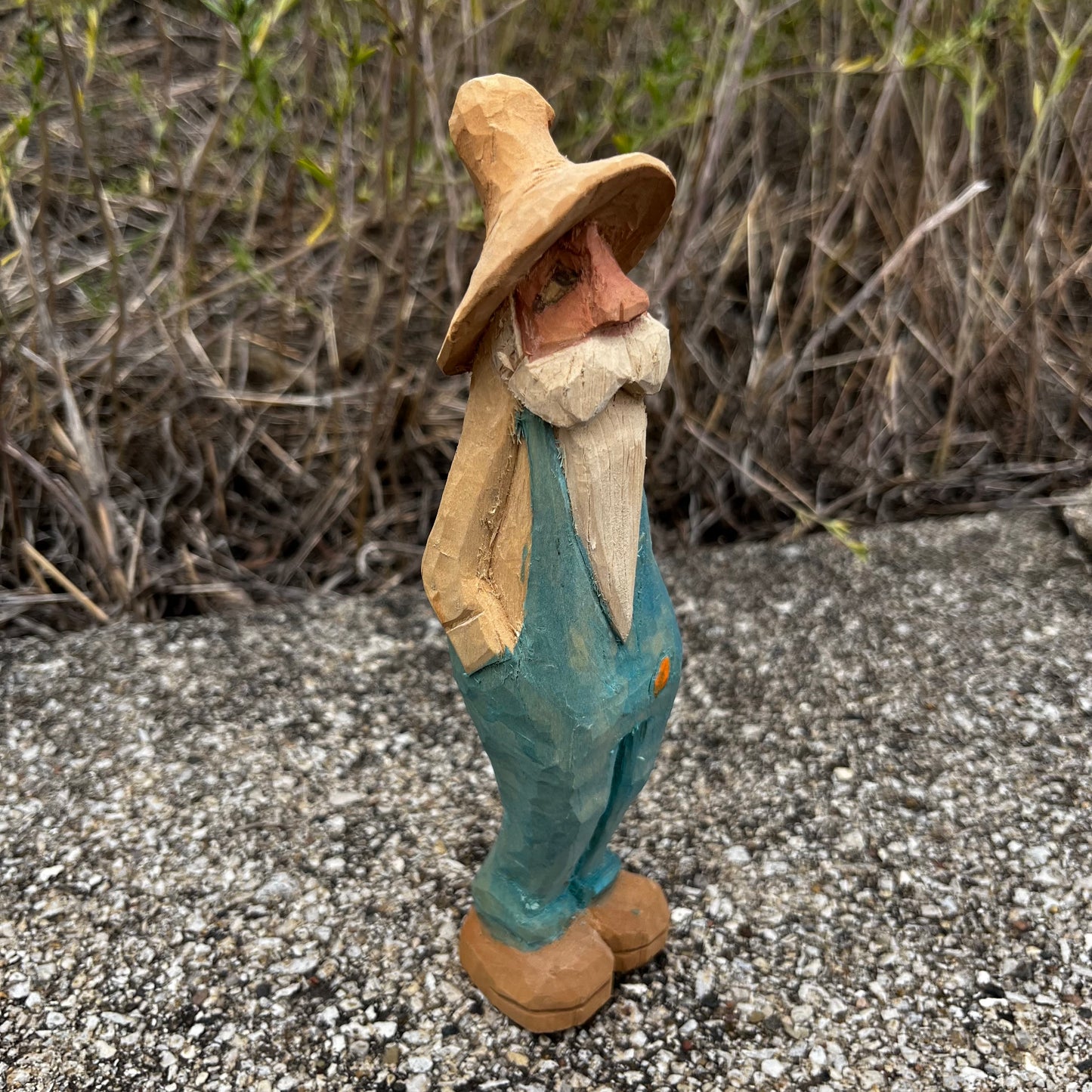 Hand carved moonshiner.