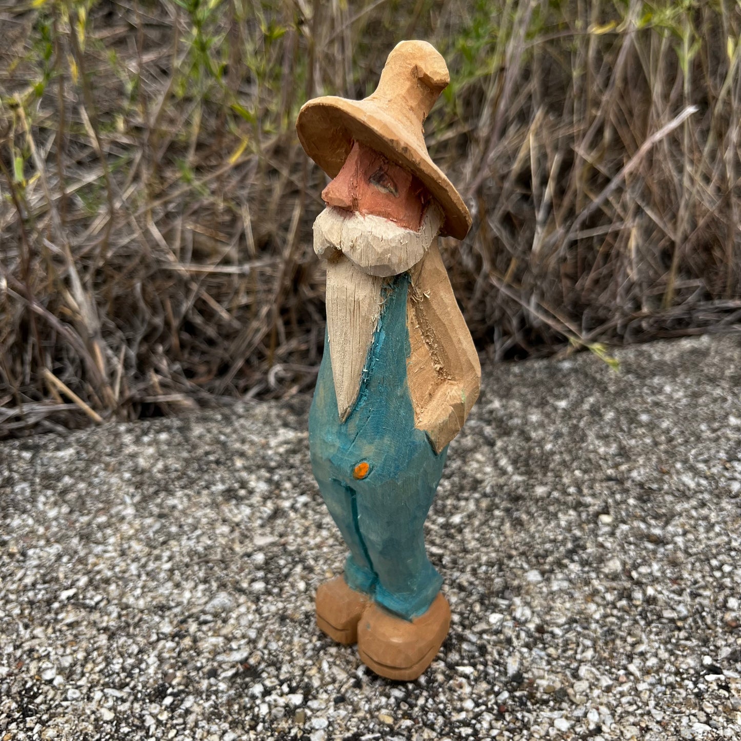 Hand carved moonshiner.