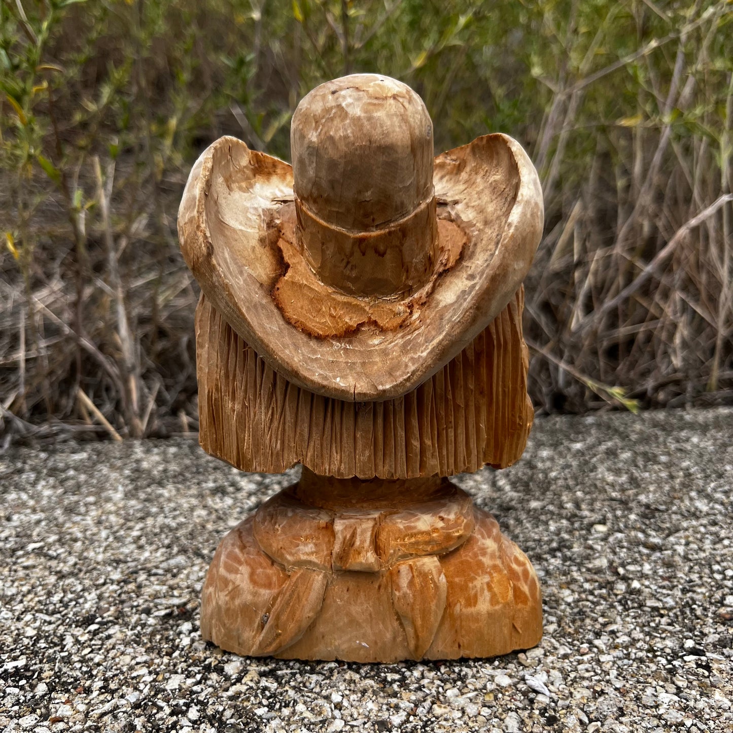 Hand carved wooden cowboy.