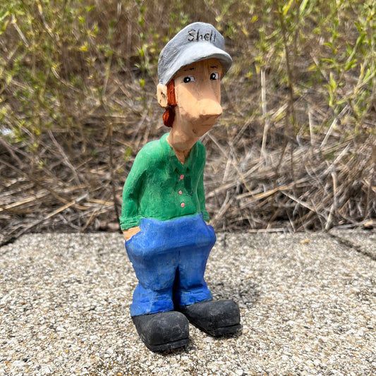 2017 Hand carved gas station attendant.