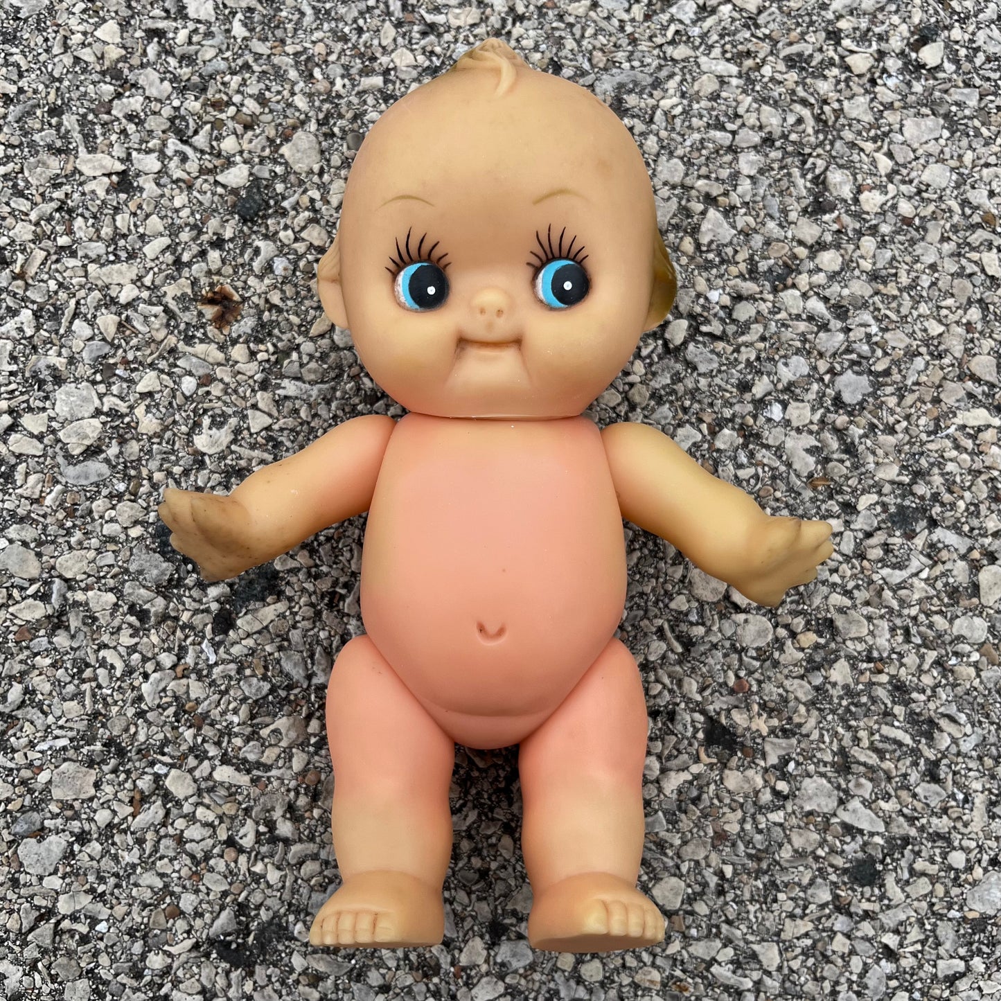 Vintage vinyl Kewpie.