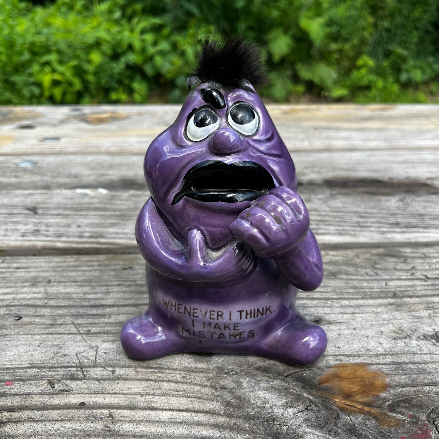 Vintage purple monster coin bank.