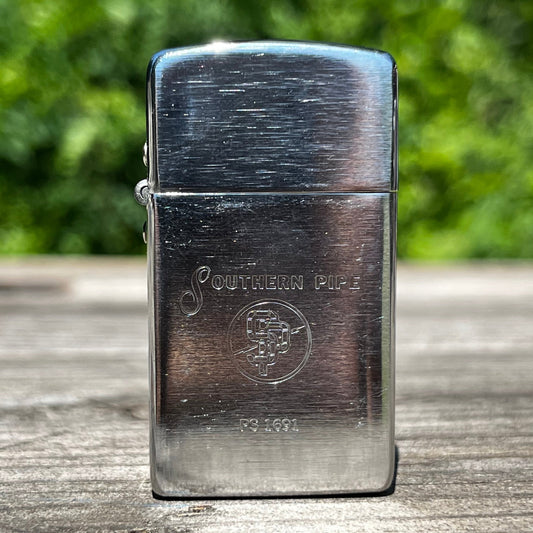 Vintage Southern Pipe flip lighter.
