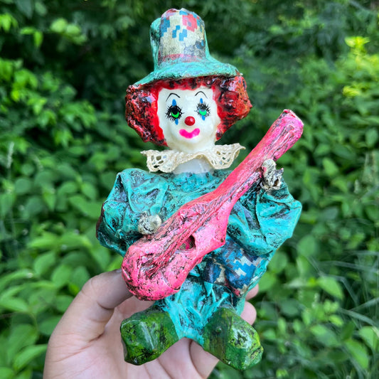 Vintage paper mache clown.