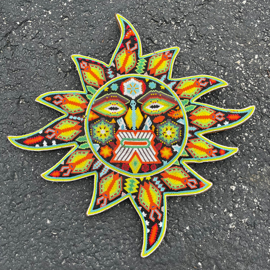 Vintage hand crafted Huichol sun.