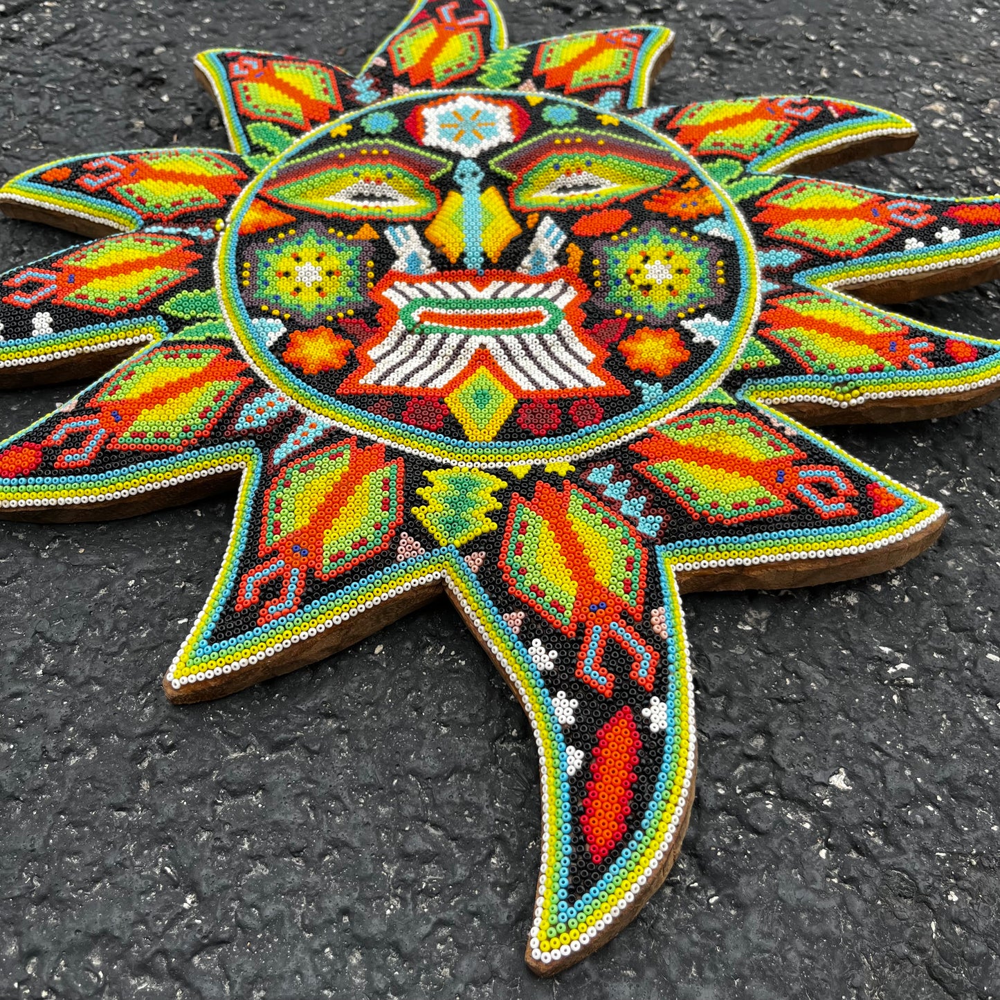 Vintage hand crafted Huichol sun.