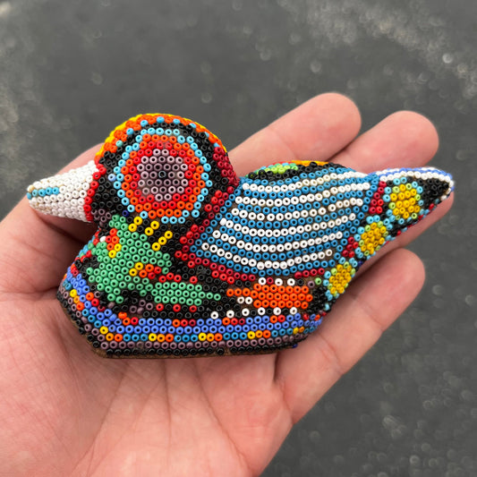 Vintage hand crafted Huichol duck.